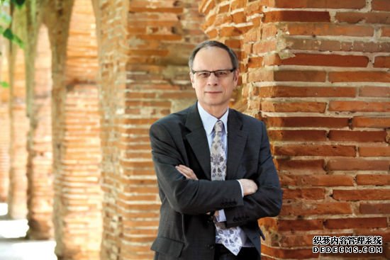 �D��Jean Tirole